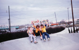 Budget Tapes and Records team members Brian Schroeder, Bob Harper, and Ian Smith at the Americana Skatepark 1977. (photo by Mitch York)